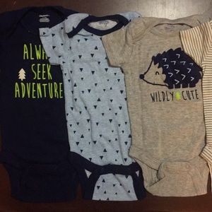 Set of 4 Gerber onesies.